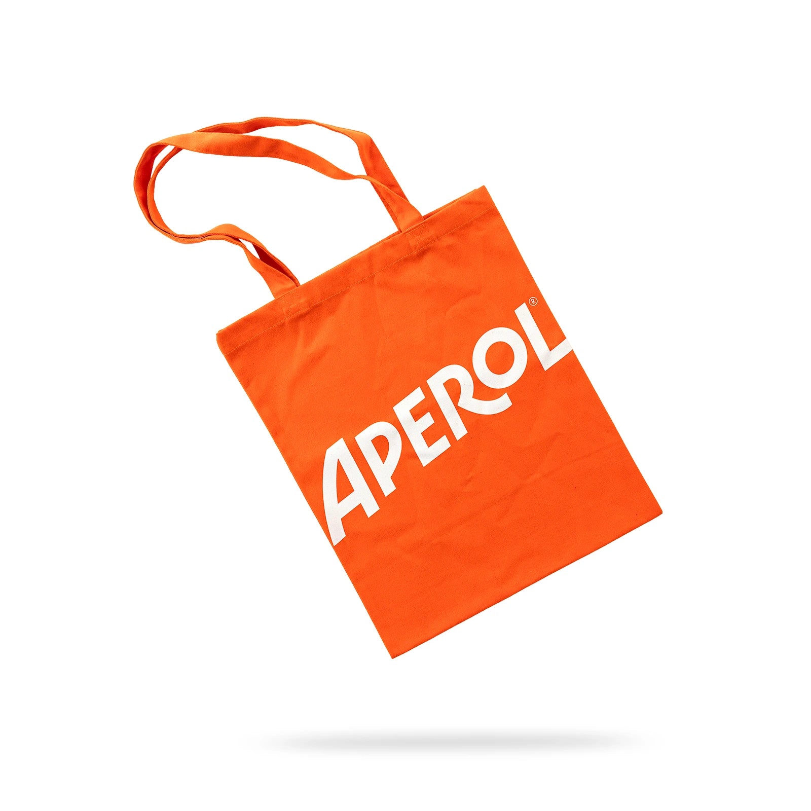 Bright orange tote bag with matching handles and large white "APEROL" logo printed on the front.
