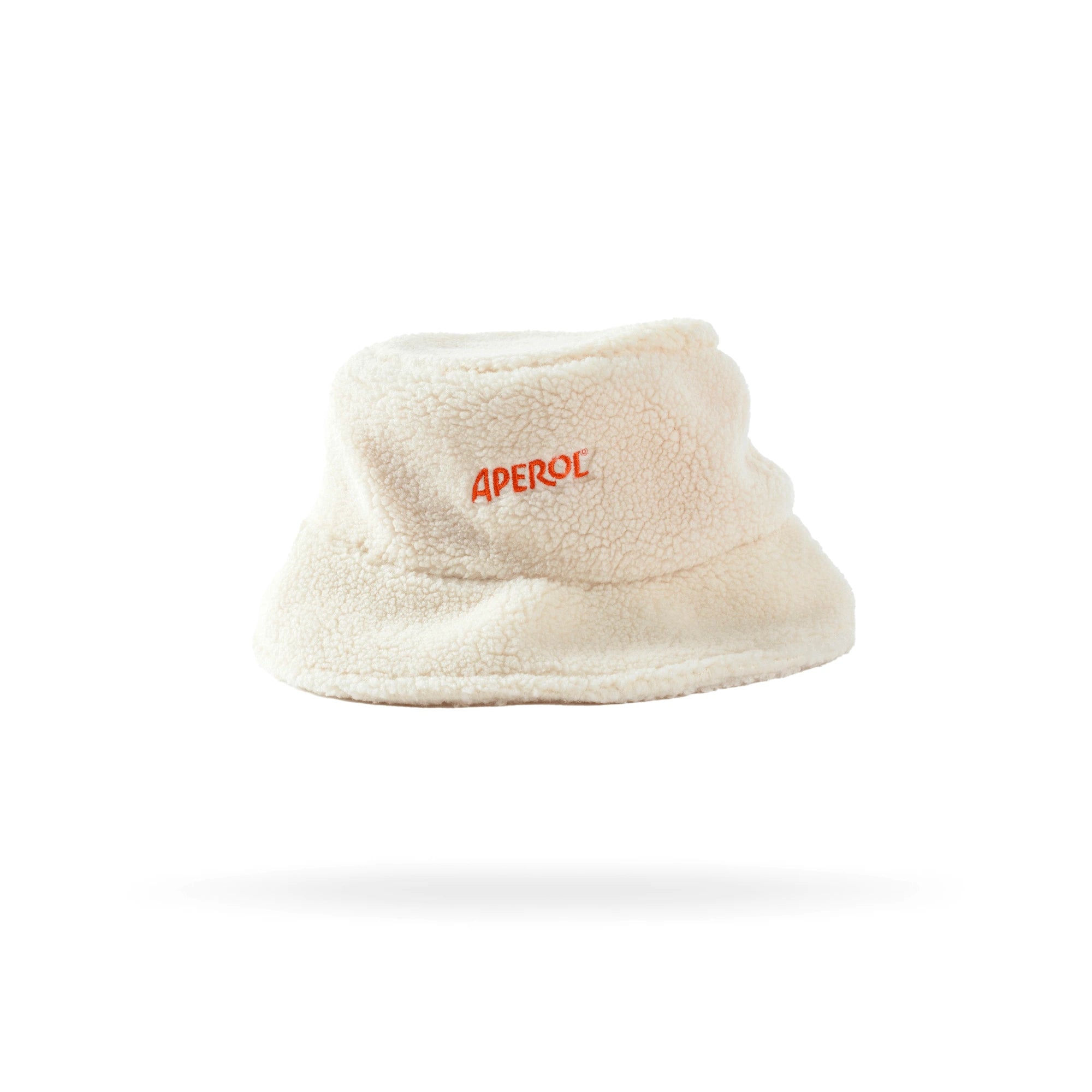 Cozy white fluffy bucket hat with a soft texture, featuring the Aperol logo embroidered in orange on the front, displayed against a white background.