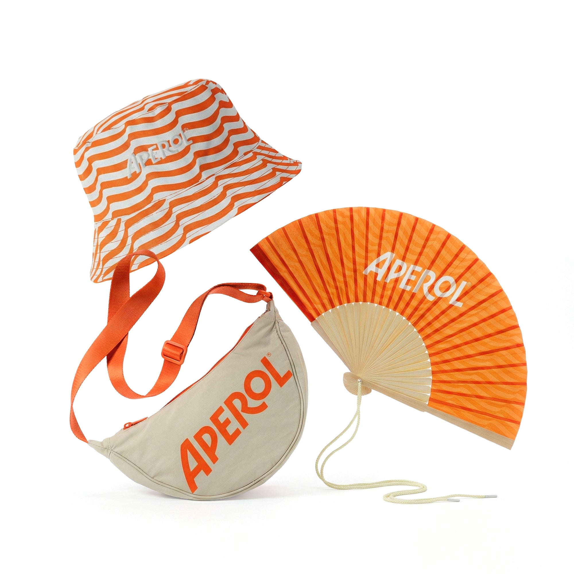 Sun hat, bag, and fan with 'Aperol' branding on a white background