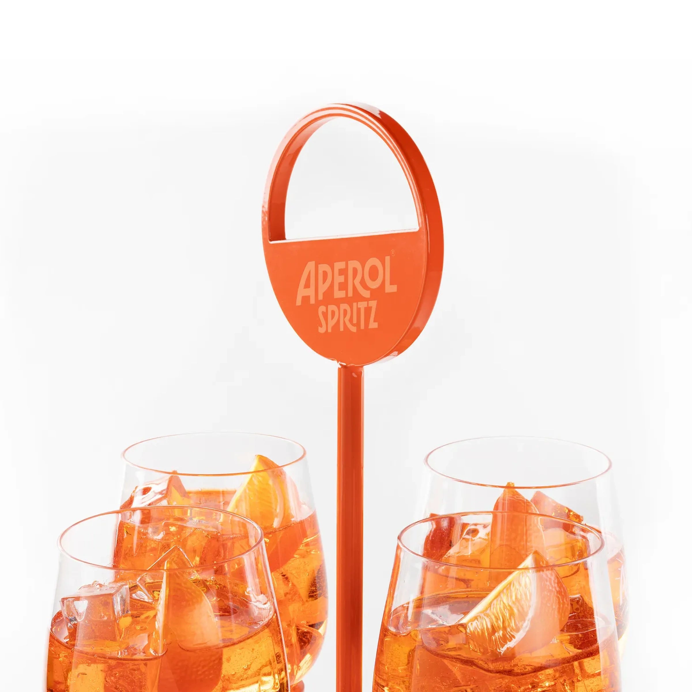 Aperol Spritz sign with glasses of the cocktail on a white background